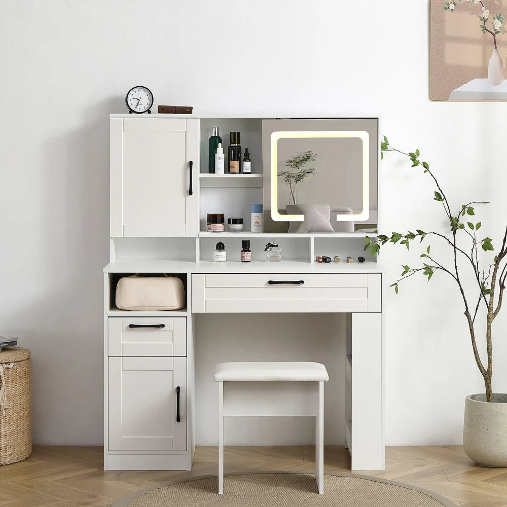 Vanity table with large sliding lighted mirror, storage shelves and upholstered stool